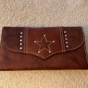 Trenditions’ Brown Leather Wallet with a Star Cutout and Silver Studs